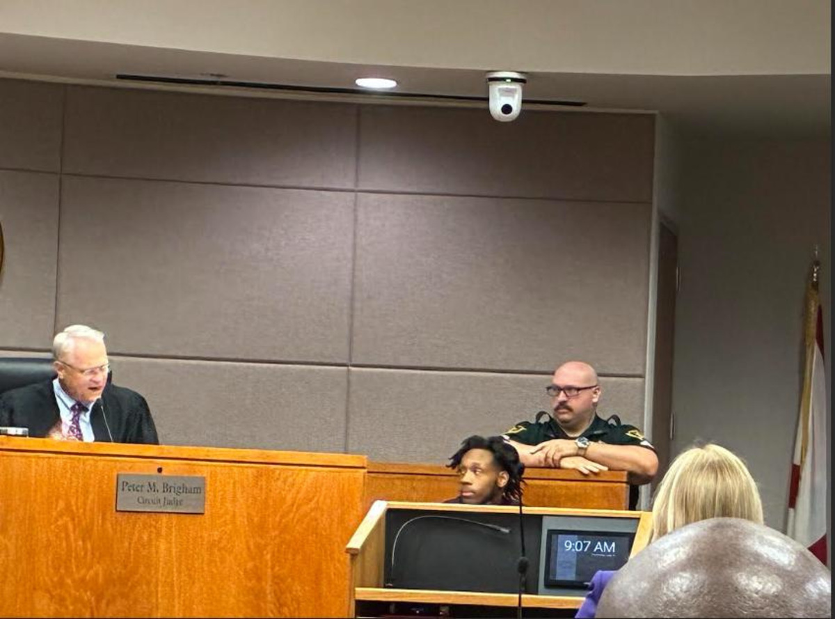 Dexavion J'Neil Brown testifies during his murder trial on July 9, 2026.