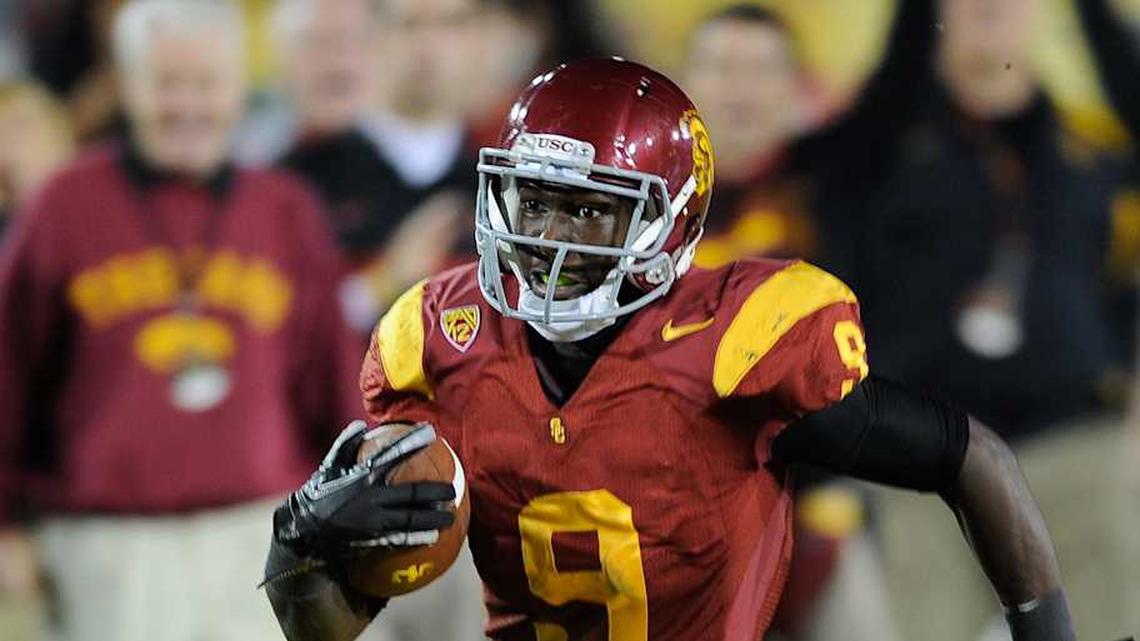  Nov 26, 2011; Los Angeles, CA, USA; Southern California Trojans receiver Marquise Lee (9) carries the ball against the UCLA Bruins at the Los Angeles Memorial Coliseum. USC defeated UCLA 50-0. Mandatory Credit: Kirby Lee/Image of Sport-Imagn Images | Kirby Lee-Imagn Images 