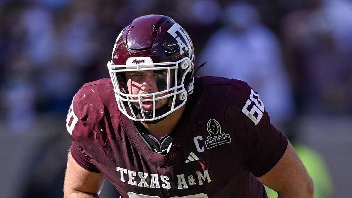  Dec 20, 2025; College Station, TX, USA; Texas A&M Aggies offensive lineman Trey Zuhn III (60) lines up during the game between the Aggies and the Hurricanes at Kyle Field. Mandatory Credit: Jerome Miron-Imagn Images | Jerome Miron-Imagn Images 