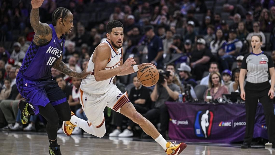 Devin Booker returns, helps steer Suns past Kings 