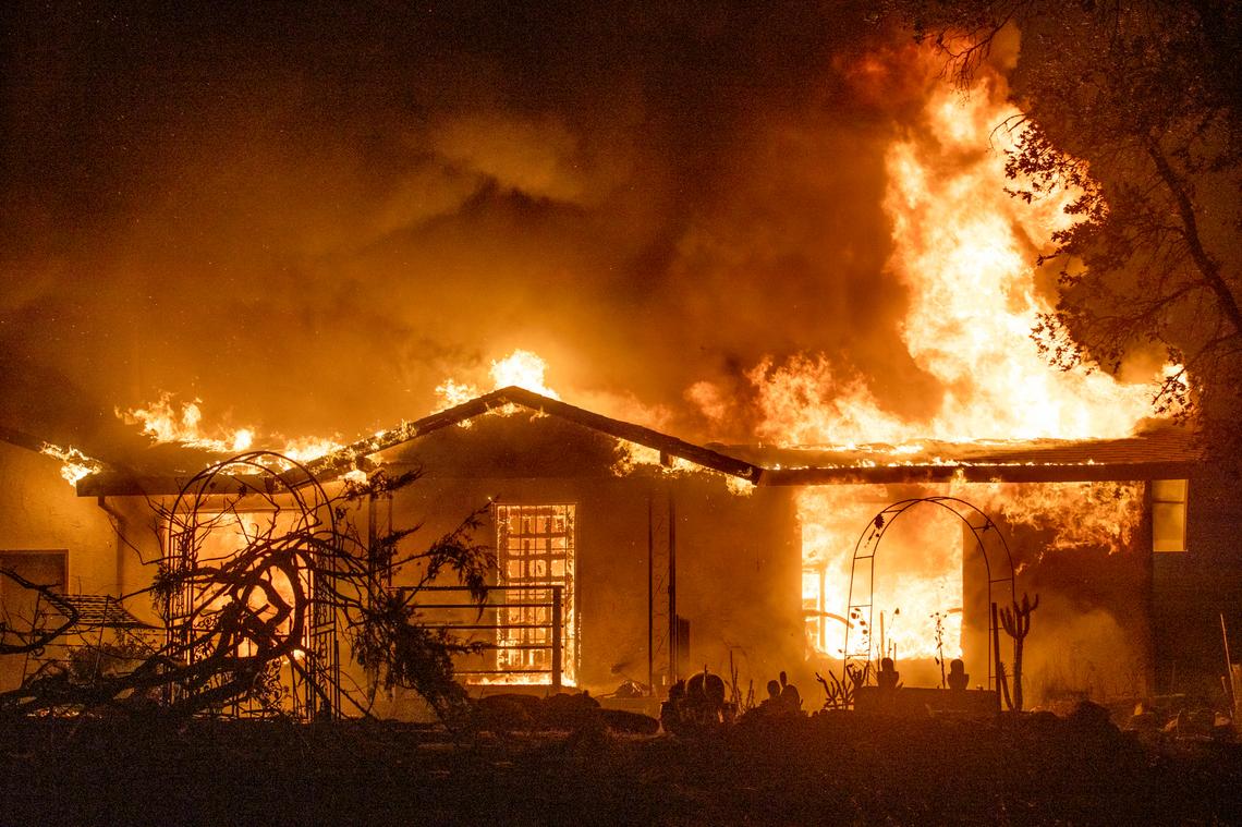 A house burns on Platina Road in the Zogg Fire near Redding on Sept. 27.