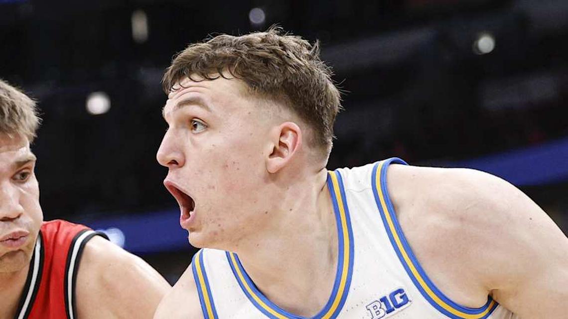  Mar 12, 2026; Chicago, IL, USA; UCLA Bruins forward Tyler Bilodeau (34) drives to the basket against Rutgers Scarlet Knights guard Harun Zrno (13) during the second half at United Center. Mandatory Credit: Kamil Krzaczynski-Imagn Images | Kamil Krzaczynski-Imagn Images 
