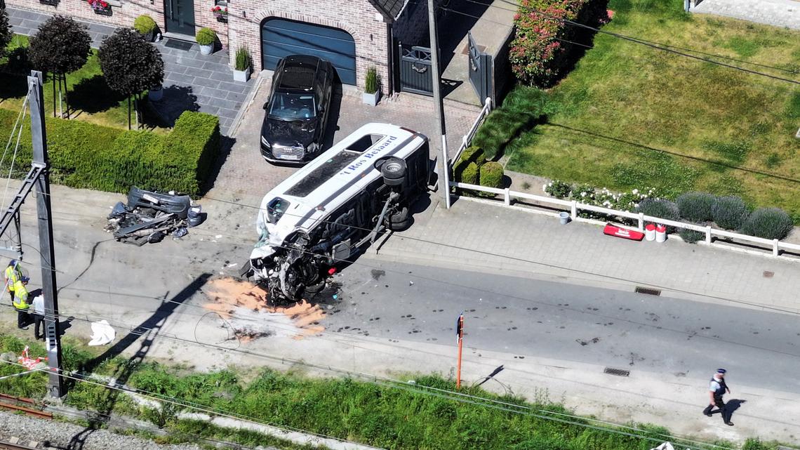 Belgian train hits school minivan, killing four including pupils