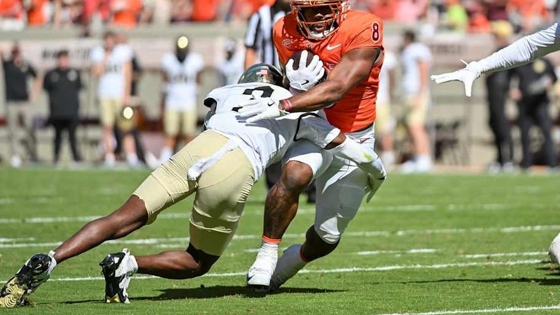  Oct 4, 2025; Blacksburg, Virginia, USA; Wake Forest Demon Deacons defensive back Karon Prunty (3) tackles Virginia Tech Hokies running back Terion Stewart (8) during the second quarter at Lane Stadium. Mandatory Credit: Brian Bishop-Imagn Images | Brian Bishop-Imagn Images 