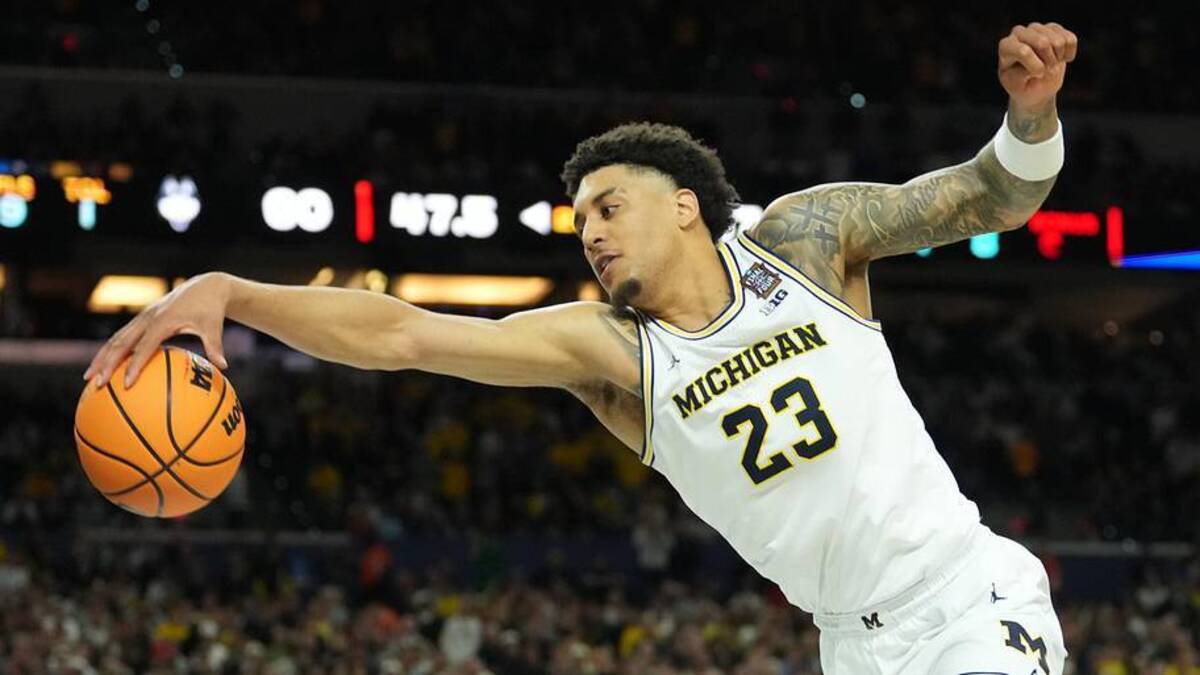  Michigan Wolverines forward Yaxel Lendeborg (23) in action against the Connecticut Huskies in the second half during the national championship of the Final Four of the men's 2026 NCAA Tournament at Lucas Oil Stadium. Mandatory Credit: Robert Deutsch-Imagn Images | Robert Deutsch-Imagn Images 