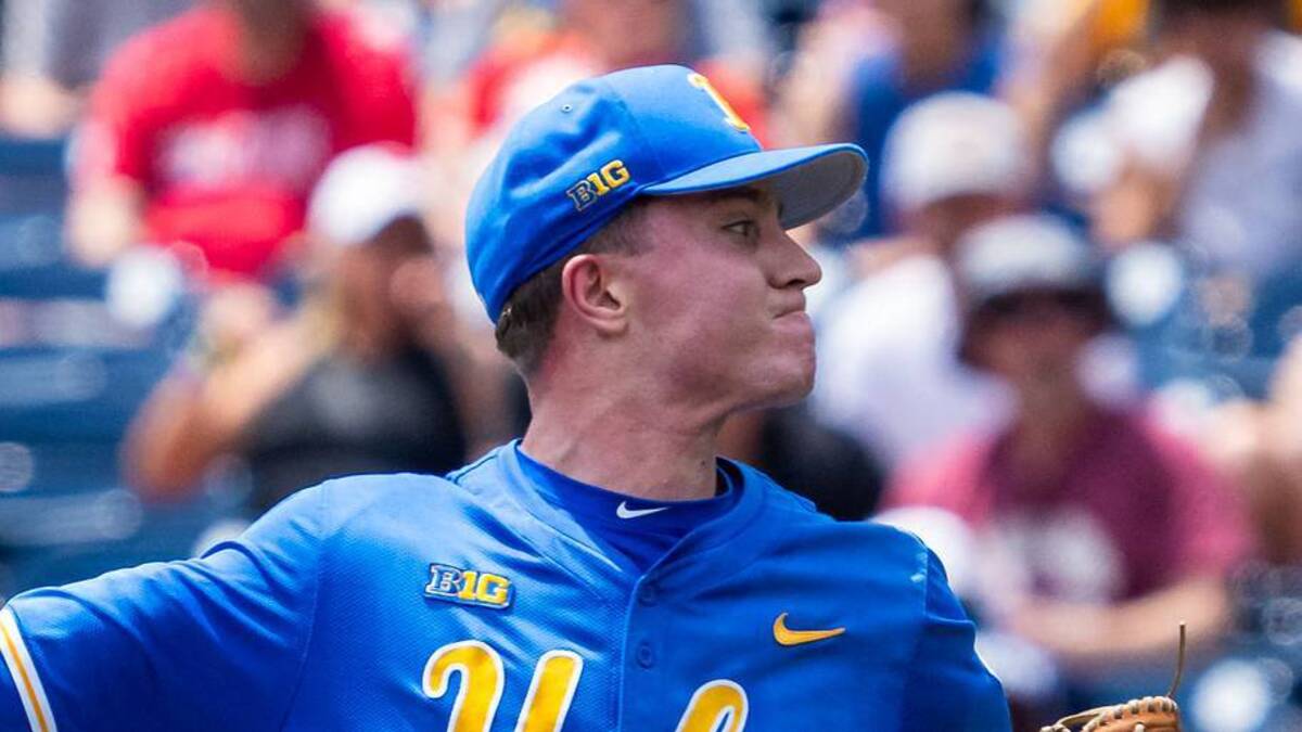  Jun 14, 2025; Omaha, Neb, USA; UCLA Bruins starting pitcher Michael Barnett (55) pitches against the Murray State Racers during the first inning at Charles Schwab Field. Mandatory Credit: Dylan Widger-Imagn Images | IMAGN IMAGES via Reuters Connect 