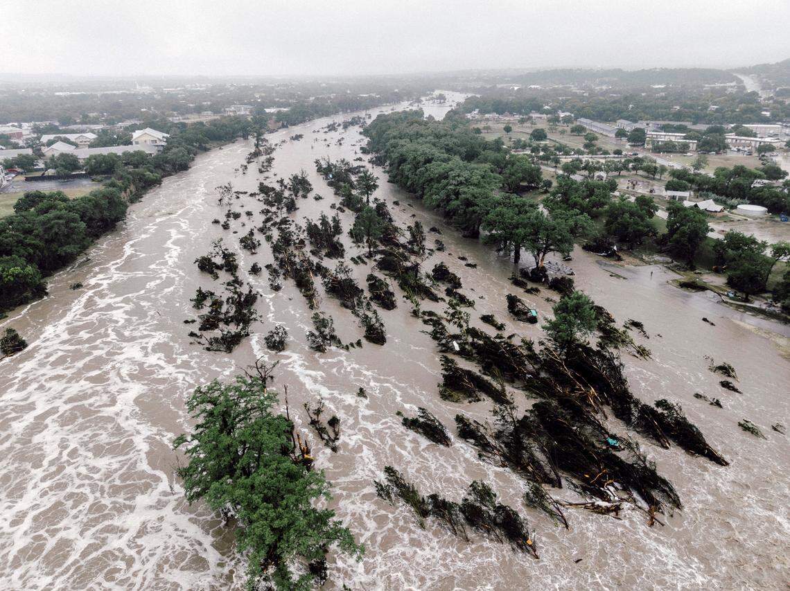 The flooded Guadalupe River in Kerrville, Texas, on Friday, July 4, 2025. Hundreds of emergency personnel were searching for stranded people on Saturday. The Texas National Guard made 237 rescues and evacuations using helicopters and rescue swimmers, a guard commander said.