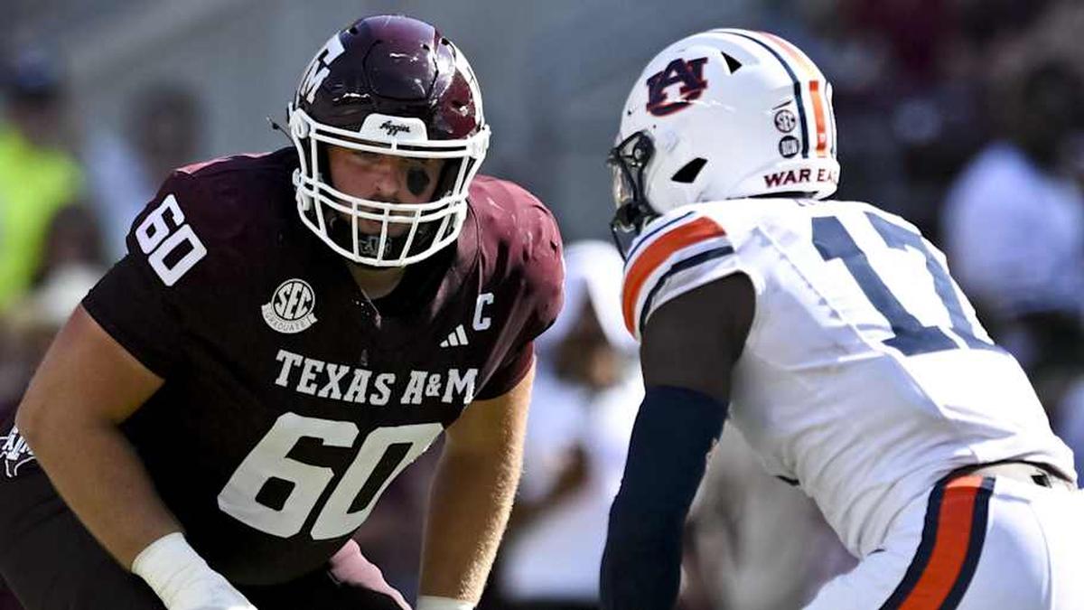  Sep 27, 2025; College Station, Texas, USA; Texas A&M Aggies offensive lineman Trey Zuhn III (60) lines up during the first half against the Auburn Tigers at Kyle Field. Mandatory Credit: Maria Lysaker-Imagn Images | Maria Lysaker-Imagn Images 