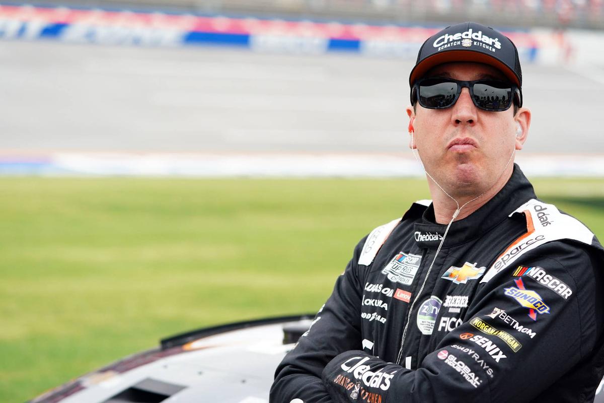 Apr 20, 2024; Talladega, Alabama, USA; NASCAR Cup Series driver Kyle Busch (8) waits by his car on pit road during qualifying for the Geico 500 at Talladega Superspeedway. Mandatory Credit: John David Mercer-USA TODAY Sports 