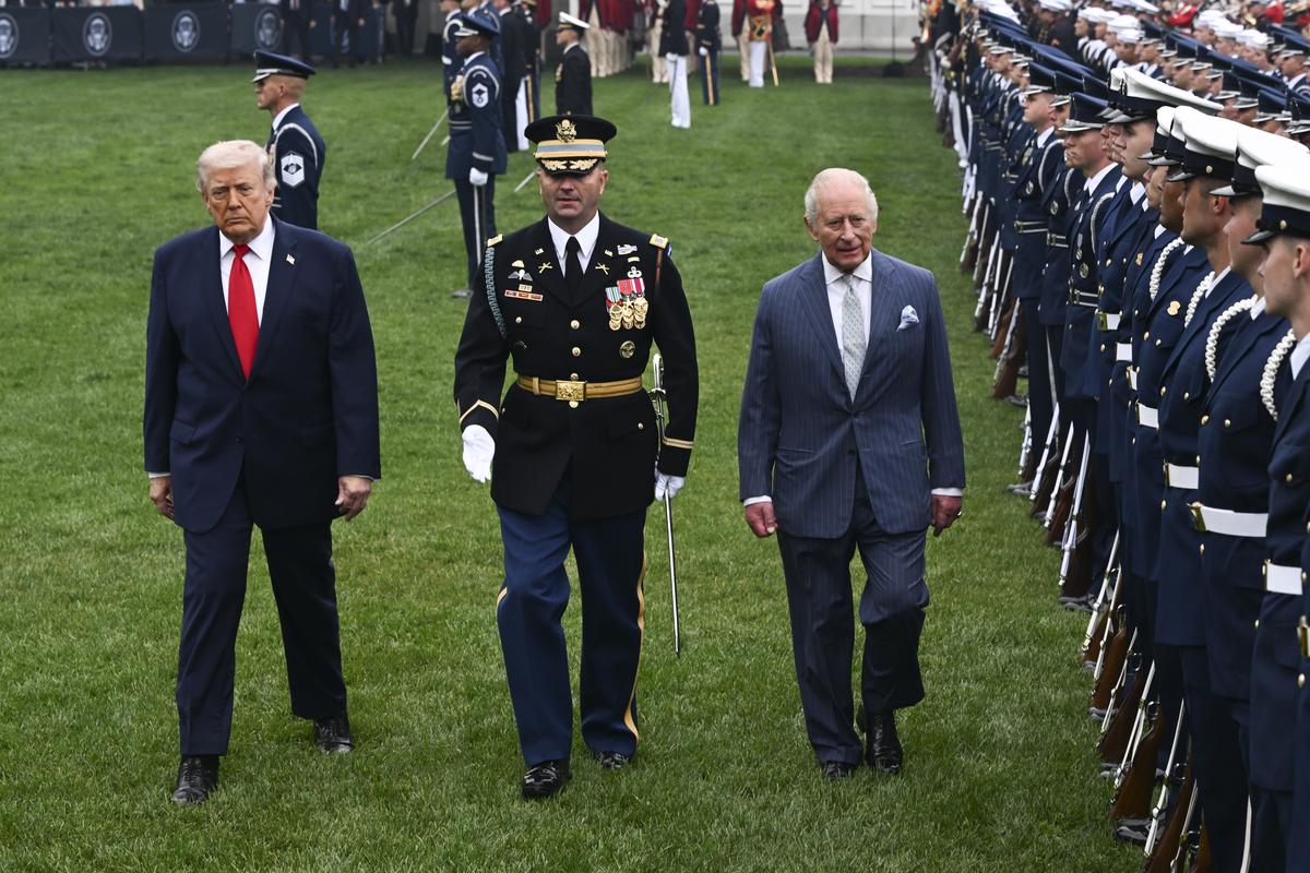 President Donald Trump, left, and King Charles III inspect members of U.S. military honor guards during an arrival ceremony on the South Lawn of the White House in Washington, on Tuesday, April 28, 2026. (Kenny Holston/The New York Times)