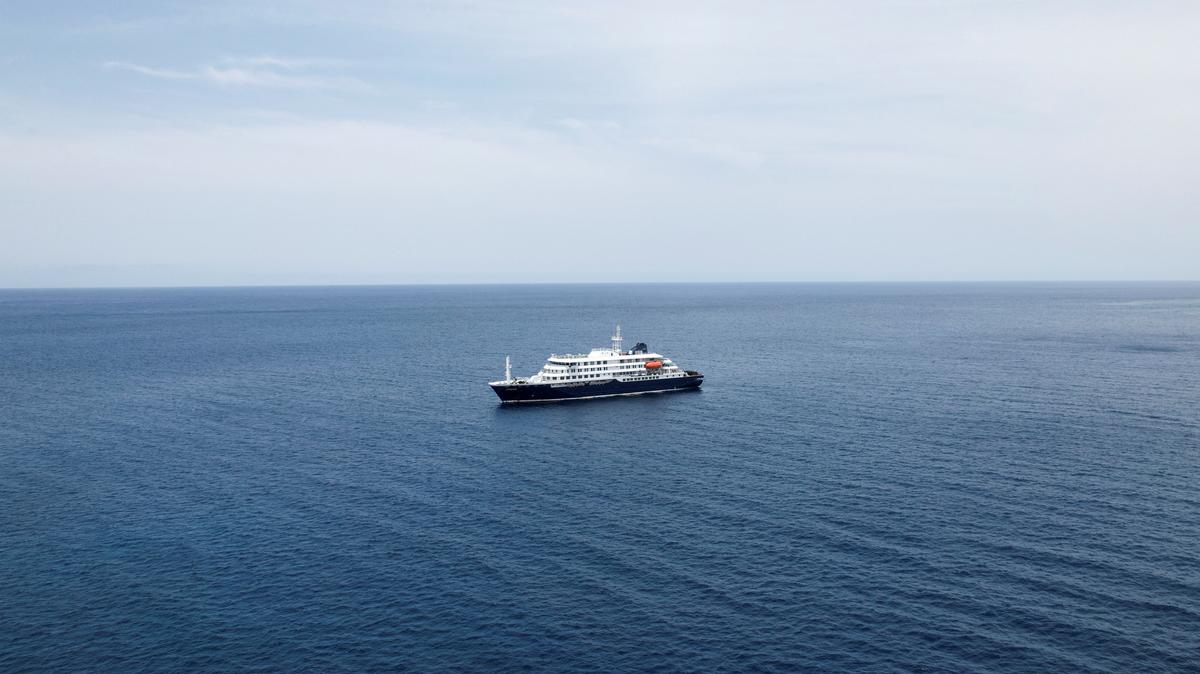 A drone view of the cruise ship MV Hondius, carrying passengers suspected of having cases of hantavirus on board, as it prepares to leave Praia, Cape Verde, on Wednesday.