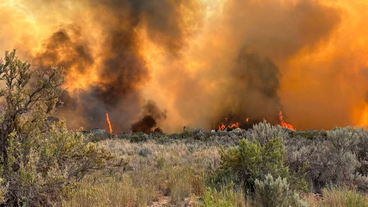 The Dry Creek fire burns in Garfield County on June 23. Three wildfires burning in western Colorado have consumed nearly 50,000 acres - roughly 78 square miles - and killed three firefighters, according to the responding agencies on Monday.