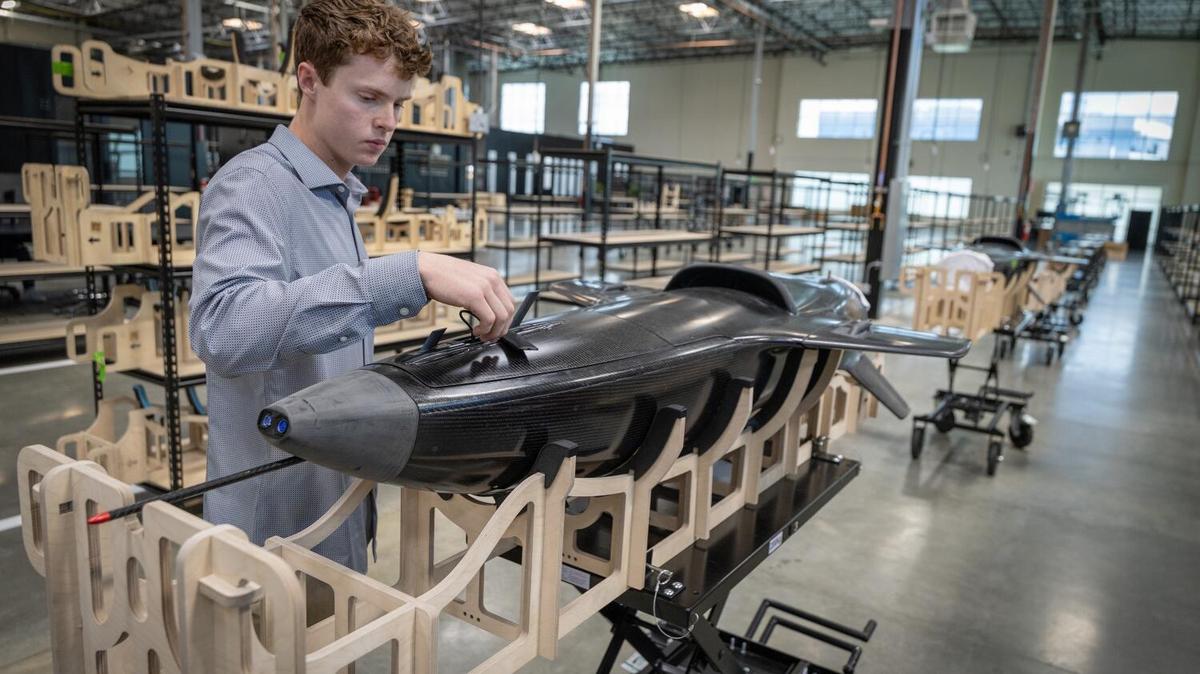 Huntington Beach, CA - September 11: Former Massachusetts Institute of Technology student Ethan Thornton, 21, founder of Huntington Beach-based defense tech startup Mach Industries, views production of the missile concept Viper, a VTOL strike aircraft designed to redefine air combat, at the headquarters in Huntington Beach Thursday, Sept. 11, 2025. Mach Industries, a defense startup that makes autonomous aircraft, just received another $100 million in venture capital funding, valuing the company at close to half a billion dollars. (Allen J. Schaben / Los Angeles Times)
