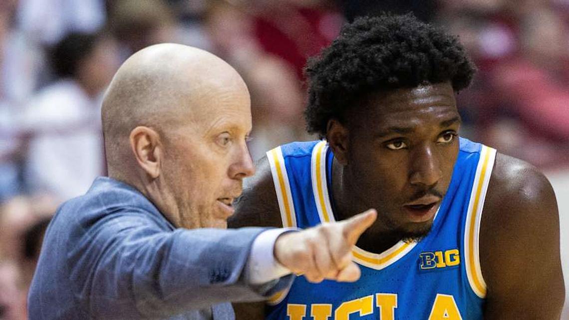  Feb 14, 2025; Bloomington, Indiana, USA; UCLA Bruins head coach Mick Cronin talks to guard Eric Dailey Jr. (3) in the second half against the Indiana Hoosiers at Simon Skjodt Assembly Hall. Mandatory Credit: Trevor Ruszkowski-Imagn Images | Trevor Ruszkowski-Imagn Images 
