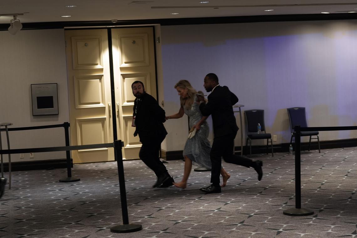 The scene at the Washington Hilton after gunfire broke out at the White House Correspondents' Association dinner in Washington on Saturday, April 25, 2026. President Donald Trump was rushed from the stage but appeared to be unharmed. (Salwan Georges/The New York Times)