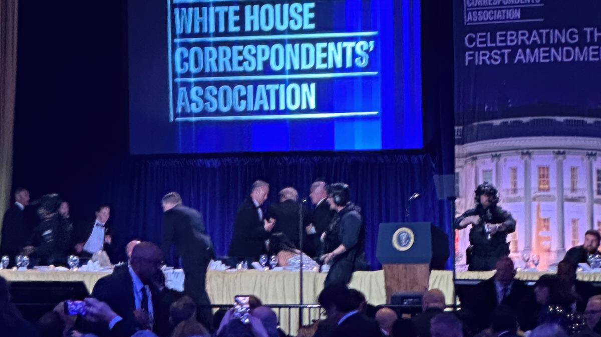 Trump Correspondents. U.S. Secret Service agents surround President Donald Trump as he is taken from the stage after a shooting incident outside the ballroom during the White House Correspondents Dinner, Saturday, April 25, 2026, in Washington.