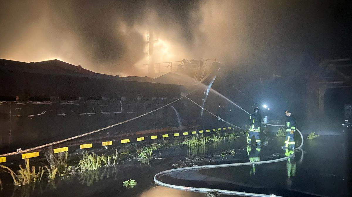 FILE PHOTO: Firefighters extinguish a burning cargo vessel damaged during Russian overnight drone and missile strikes, amid Russia's attack on Ukraine, at a port in Odesa region, Ukraine, in this handout picture released December 23, 2025. Press service of the State Emergency Service of Ukraine in Odesa egion/Handout via REUTERS/ File Photo