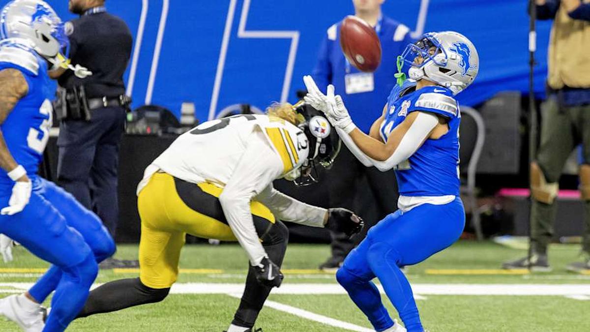  Dec 21, 2025; Detroit, Michigan, USA; Pittsburgh Steelers wide receiver Ben Skowronek (15) tackles Detroit Lions wide receiver Kalif Raymond (11) during the fourth quarter at Ford Field. Mandatory Credit: David Reginek-Imagn Images | David Reginek-Imagn Images 