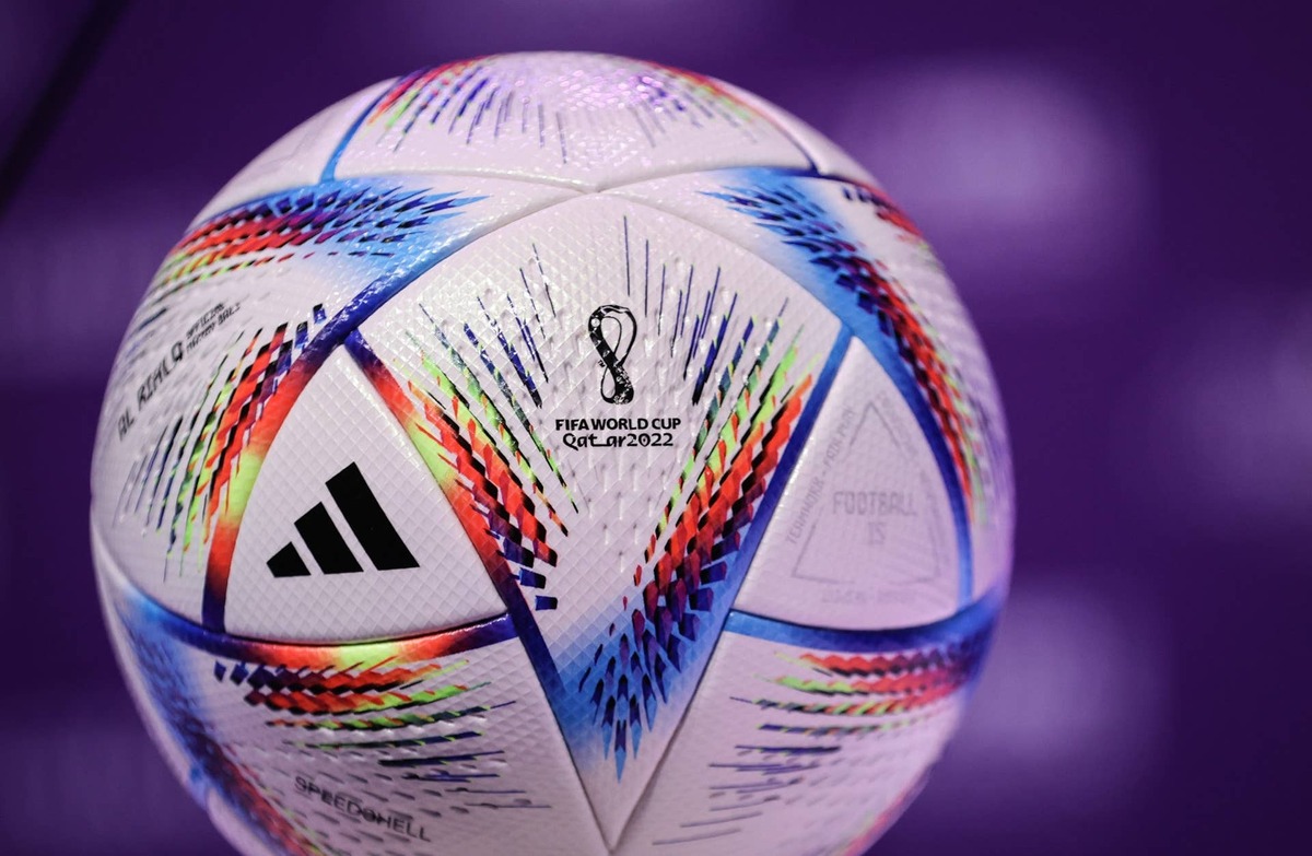  31 March 2022, Qatar, Doha: Soccer: 2022 FIFA Congress. The official match ball "Al Rihla" ("the journey" in Arabic) for the 2022 World Cup in Qatar lies on the podium during a press conference after the Fifa Congress at the Doha Exhibition & Convention Center (DECC). Photo: Christian Charisius/dpa (Photo by Christian Charisius/picture alliance via Getty Images) 