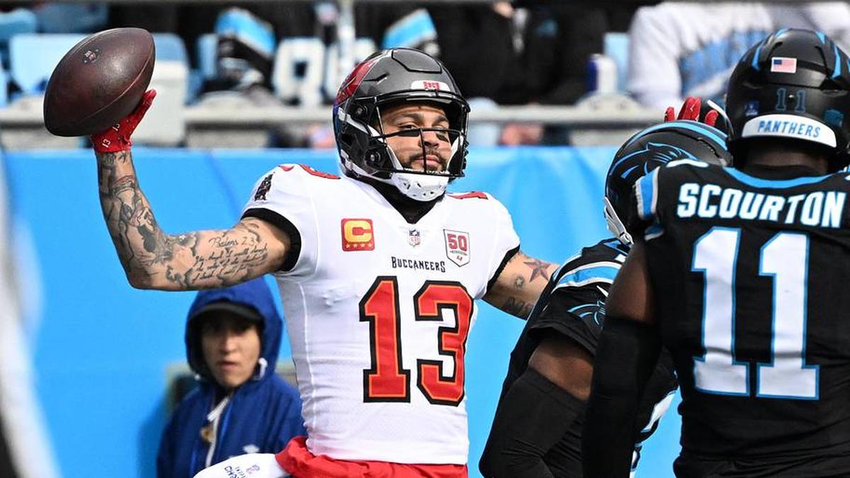  Dec 21, 2025; Charlotte, North Carolina, USA; Tampa Bay Buccaneers wide receiver Mike Evans (13) reacts after a touchdown during the first half against the Carolina Panthers at Bank of America Stadium. Mandatory Credit: Bob Donnan-Imagn Images | Bob Donnan-Imagn Images 