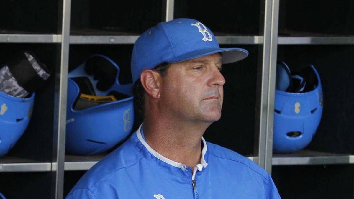  Jun 24, 2013; Omaha, NE, USA; UCLA Bruins head coach John Savage (22) looks on from the dugout before game 1 of the College World Series finals against the Mississippi State Bulldogs at TD Ameritrade Park. Mandatory Credit: Bruce Thorson-Imagn Images | Bruce Thorson-Imagn Images 