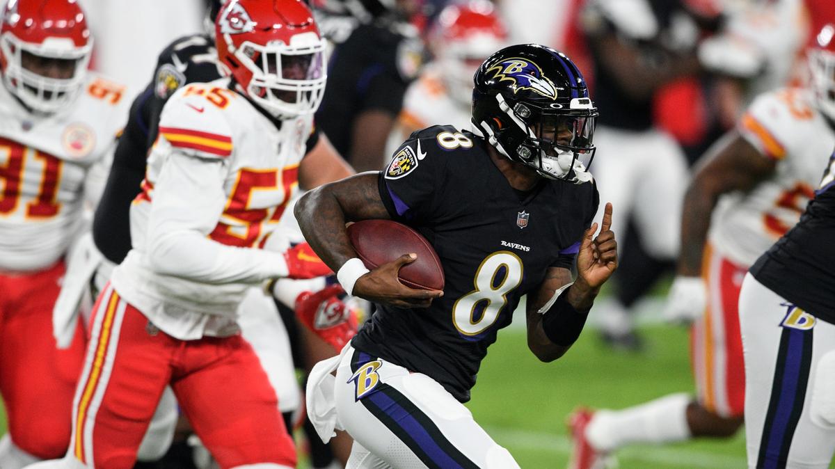 Baltimore Ravens quarterback Lamar Jackson (8) runs with the ball as he is pursued by Kansas City Chiefs defensive end Frank Clark (55) during the first half of an NFL football game Monday, Sept. 28, 2020, in Baltimore. (AP Photo/Nick Wass)