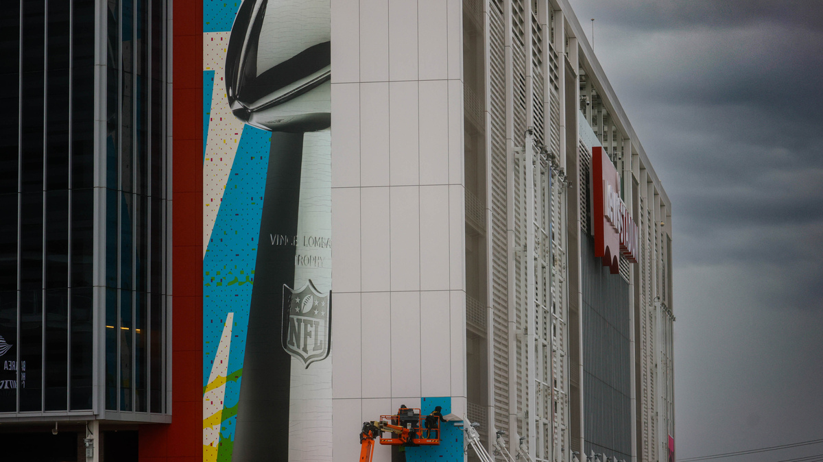 Workers take down Super Bowl signage at Levi’s Stadium in Santa Clara, Calif., on Tuesday, Feb. 10, 2026. (Shae Hammond/Bay Area News Group)