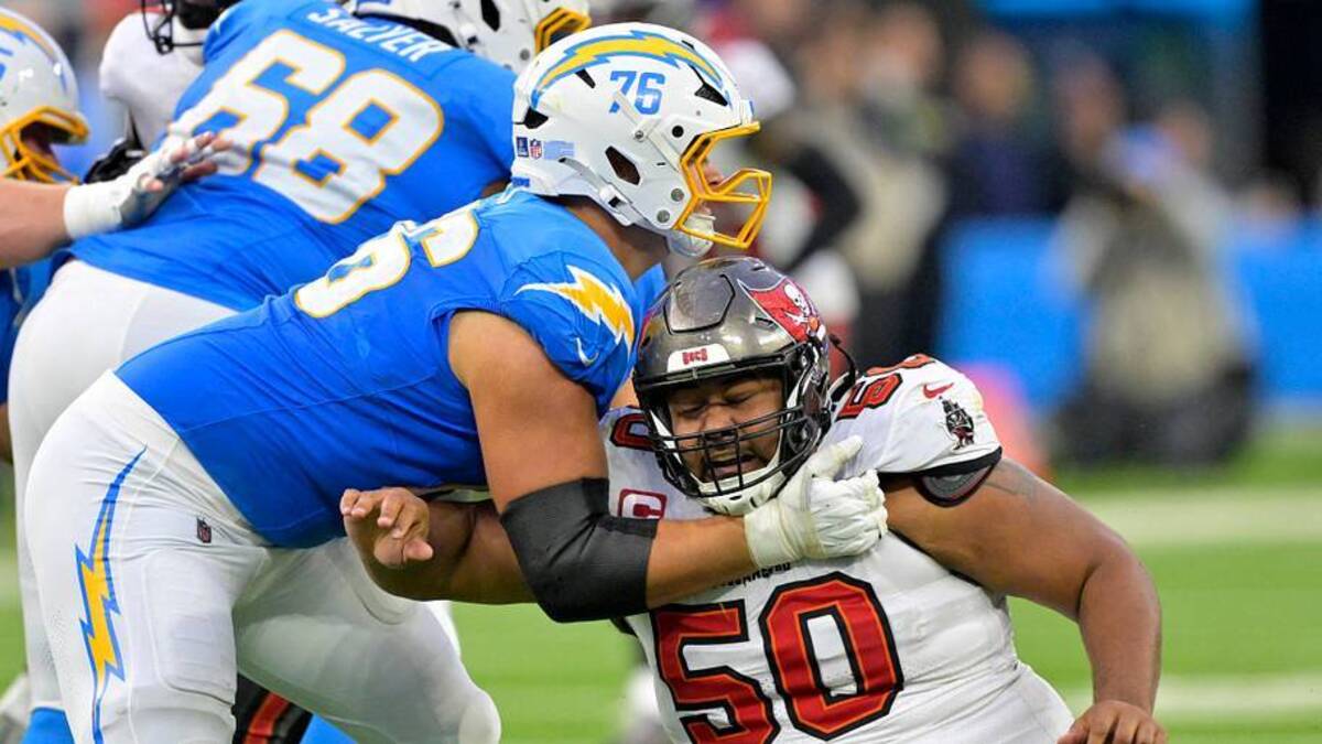  Dec 15, 2024; Inglewood, California, USA; Los Angeles Chargers offensive tackle Joe Alt (76) blocks Tampa Bay Buccaneers defensive tackle Vita Vea (50) in the second half at SoFi Stadium. Mandatory Credit: Jayne Kamin-Oncea-Imagn Images | USA TODAY Sports via Reuters Connect 
