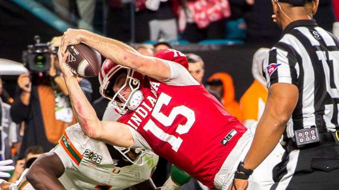  Indiana's Fernando Mendoza (15) scores a touchdown during the College Football Playoff National Championship college football game at Hard Rock Stadium in Miami Gardens on Monday, Jan. 19, 2026. | Rich Janzaruk/Herald-Times / USA TODAY NETWORK via Imagn Images 