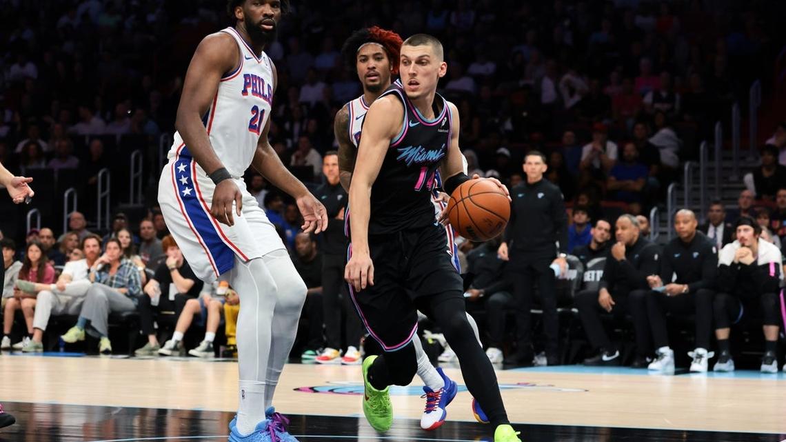 Heat use late 14-0 run to push past 76ers 