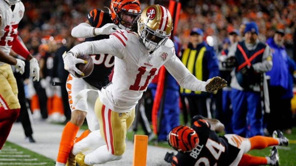  Niners receiver Brandon Aiyuk scores the game-winning touchdown in overtime against the Cincinnati Bengals at Paul Brown Stadium. Gw | USA TODAY Network via Reuters Connect 
