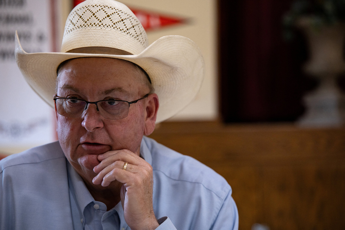 Kinney County Judge John Paul Schuster participates in an interview after attending an informational meeting hosted by the Texas Animal Health Commission, two days after the U.S. Department of Agriculture confirmed that New World screwworm was detected in a Texas calf in Zavala County, at the Cotulla High School in Cotulla, Texas, U.S. June 5, 2026.  REUTERS/Kaylee Greenlee