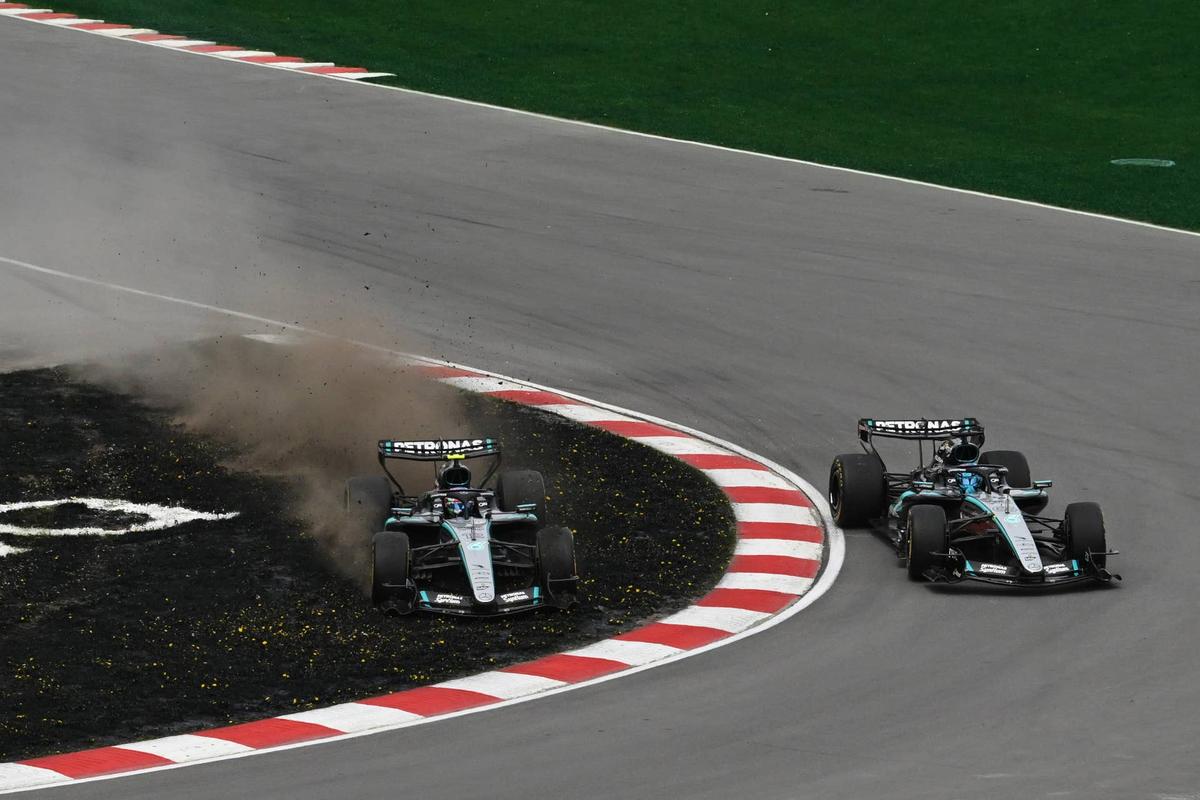  Kimi Antonelli cuts the grass as he battles for the lead with George Russell during the 2026 F1 Canadian GP Sprint. Photo by Mark Sutton - Formula 1 via Getty Images