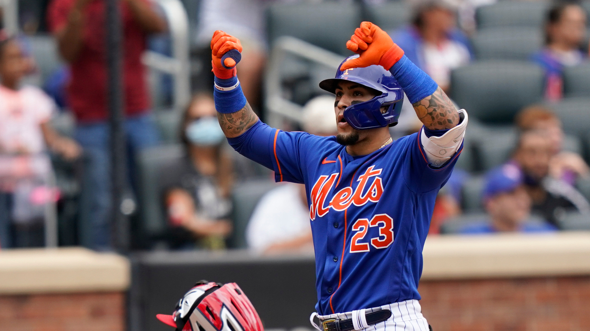 New York Mets’ Javier Baez gestures at home plate after his two-run home run that also scored Michael Conforto during the fourth inning of a baseball game against the Washington Nationals, Sunday, Aug. 29, 2021, in New York. (AP Photo/Corey Sipkin)