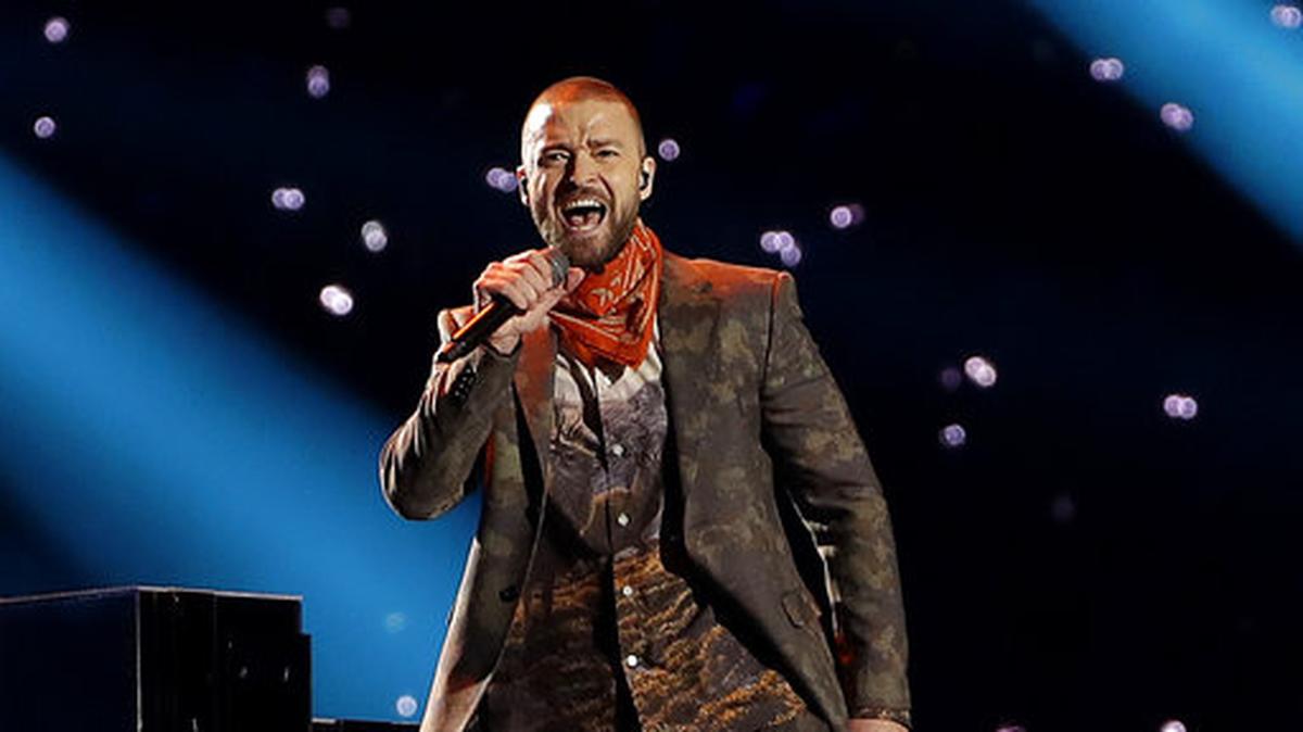 FILE - In this Feb. 4, 2018 file photo, Justin Timberlake performs during halftime of the NFL Super Bowl 52 football game in Minneapolis. Timberlake says he is postponing his Wednesday night concert in New York City because his vocal chords are “severely bruised.” He says he has rescheduled the Madison Square Garden concert for January 31, which is his 38th birthday.