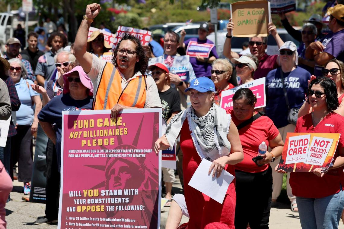 A protest co-led by the California Nurses Association. called on Rep. Young Kim, R-Anaheim Hills, to vote against President Donald Trump’s spending bill that would slash spending on healthcare and other federal safety net programs while extending tax cuts outside Kim’s field office in Anaheim on Tuesday.