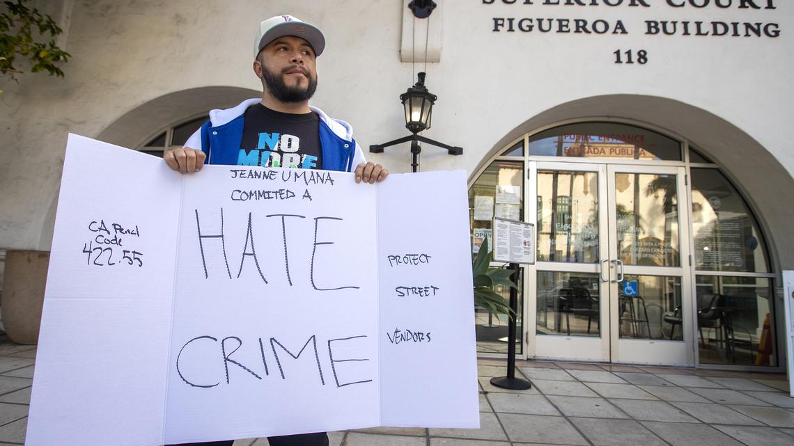Activist Edin Alex Enamorado protests outside Santa Barbara Superior Court during the arraignment for a woman caught on two separate videos using racist language to Latino men, Nov. 30, 2023. (Mel Melcon/Los Angeles Times/TNS)