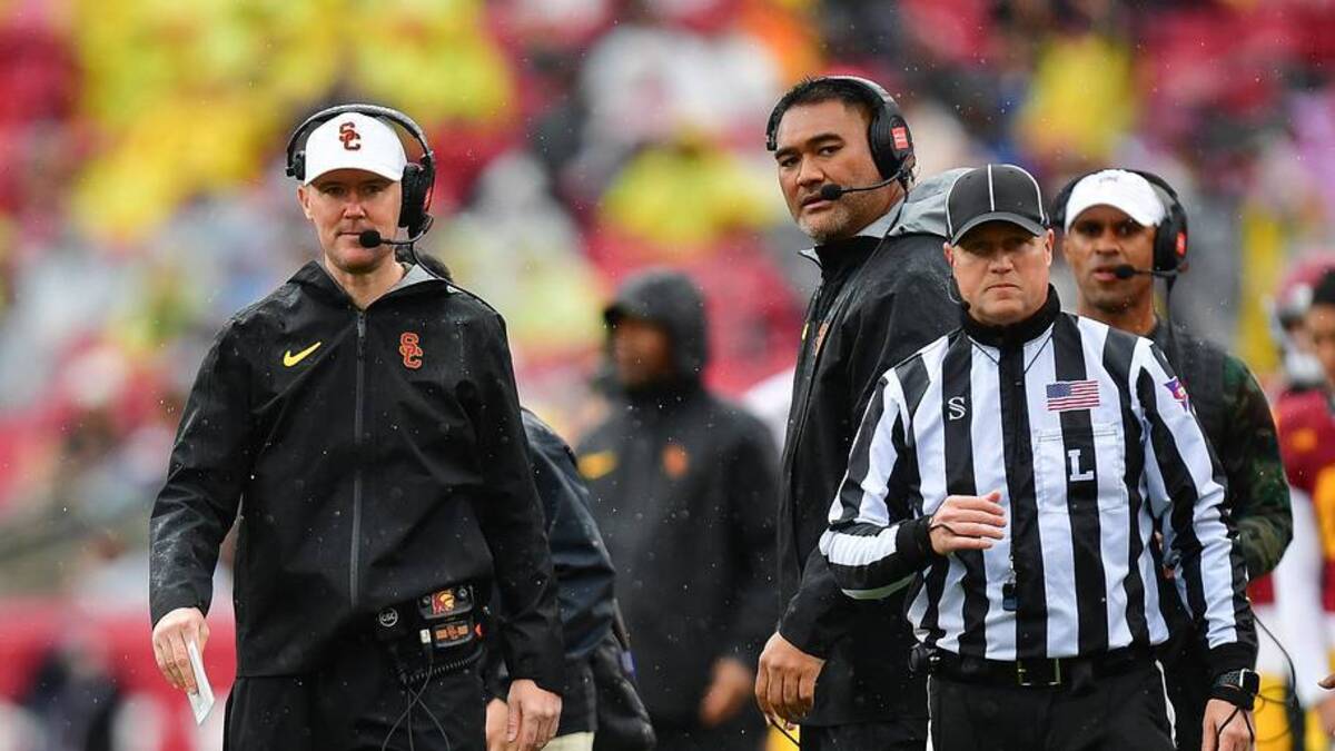  Nov 15, 2025; Los Angeles, California, USA; Southern California Trojans head coach Lincoln Riley watches game action against the Iowa Hawkeyes during the first half at the Los Angeles Memorial Coliseum. Mandatory Credit: Gary A. Vasquez-Imagn Images | Gary A. Vasquez-Imagn Images 