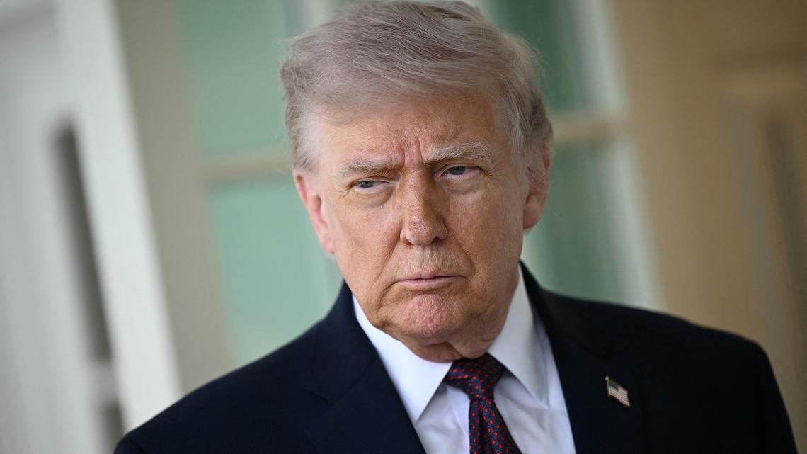 President Donald Trump speaks to the press outside the Oval Office at the White House in Washington, D.C., on April 13.
