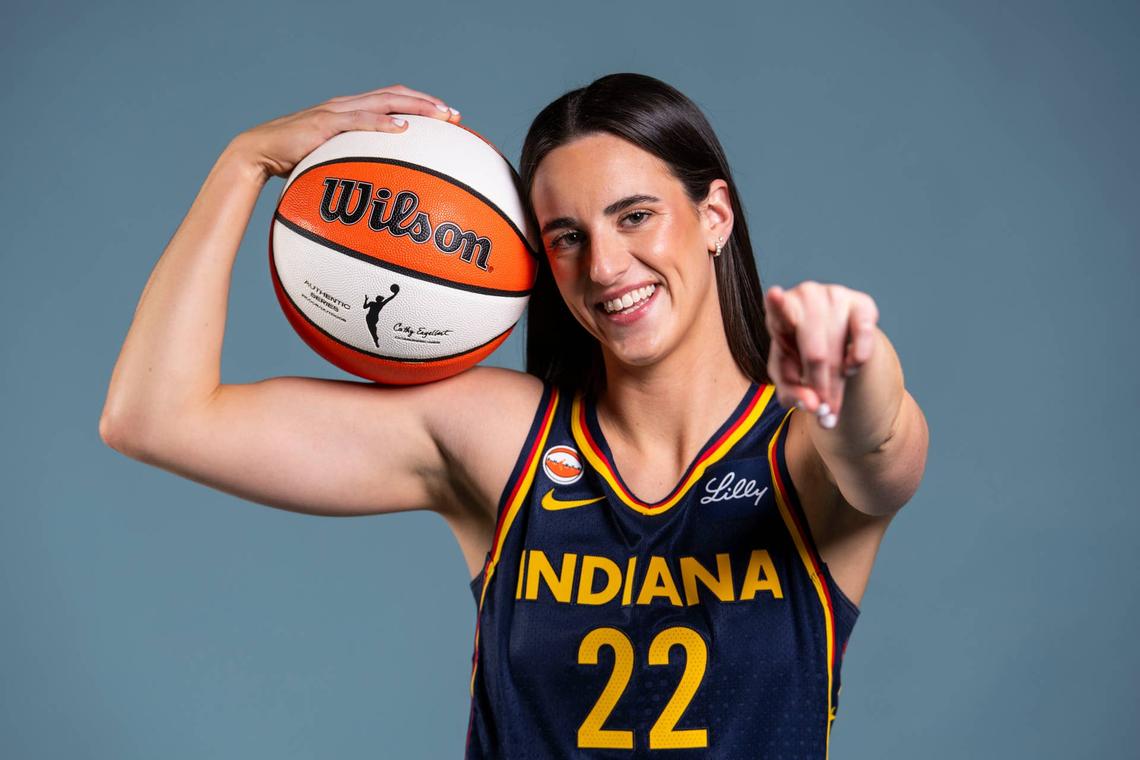  Indiana Fever guard Caitlin Clark (22) poses for a photo Wednesday, April 22, 2026, during media day at Gainbridge Fieldhouse in Indianapolis. 