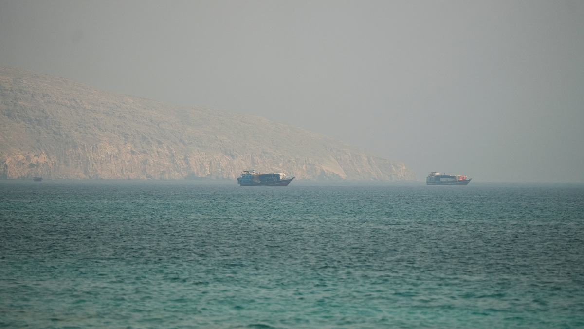 FILE PHOTO: Vessels at the Strait of Hormuz, as seen from Musandam, Oman, July 9, 2026. REUTERS/Stringer/File Photo