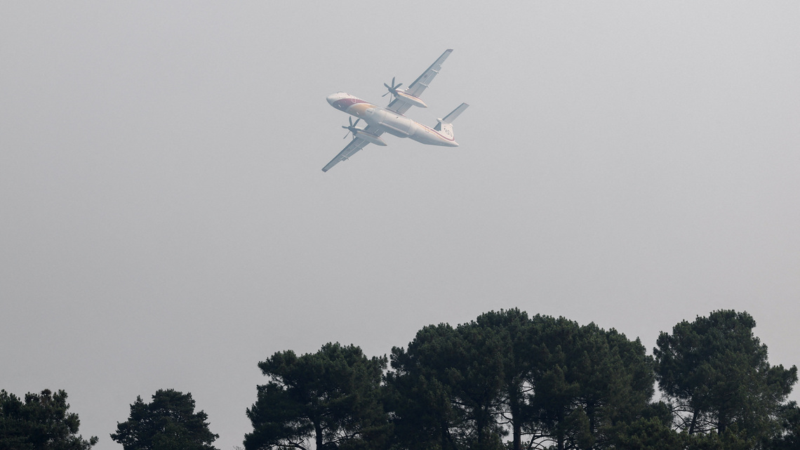 Wildfire rages near Paris as heatwave scorches Europe 