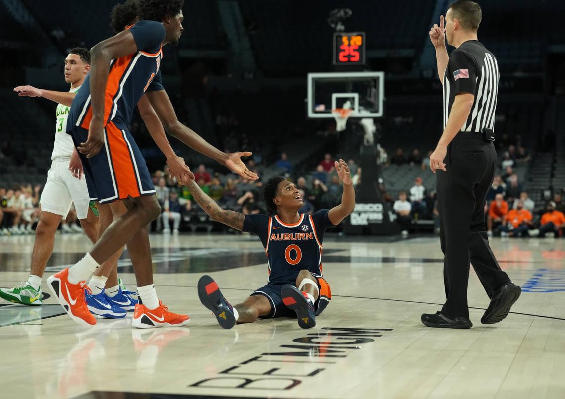  Auburn Tigers guard Tahaad Pettiford (0) appeals to the referee during the first half against the Oregon Ducks of a 2025 Players Era Festival group play game at Michelob ULTRA Arena. © Kirby Lee-Imagn Images