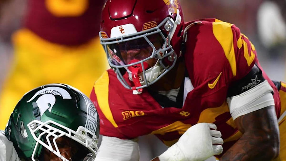  Sep 20, 2025; Los Angeles, California, USA; Southern California Trojans linebacker Desman Stephens II (23) moves in against Michigan State Spartans wide receiver Omari Kelly (1) during the first half at the Los Angeles Memorial Coliseum. Mandatory Credit: Gary A. Vasquez-Imagn Images | Gary A. Vasquez-Imagn Images 