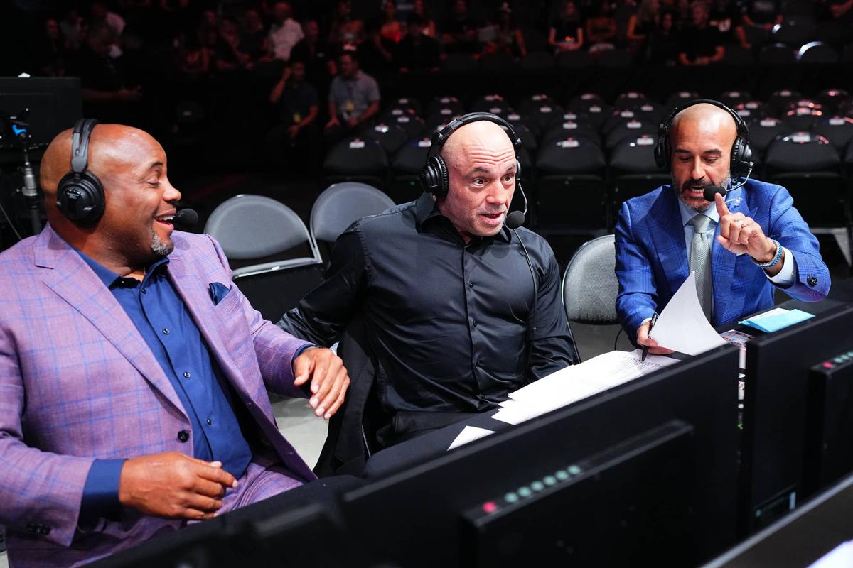  Daniel Cormier, Joe Rogan, and Jon Anik Chris Unger-GettyImages