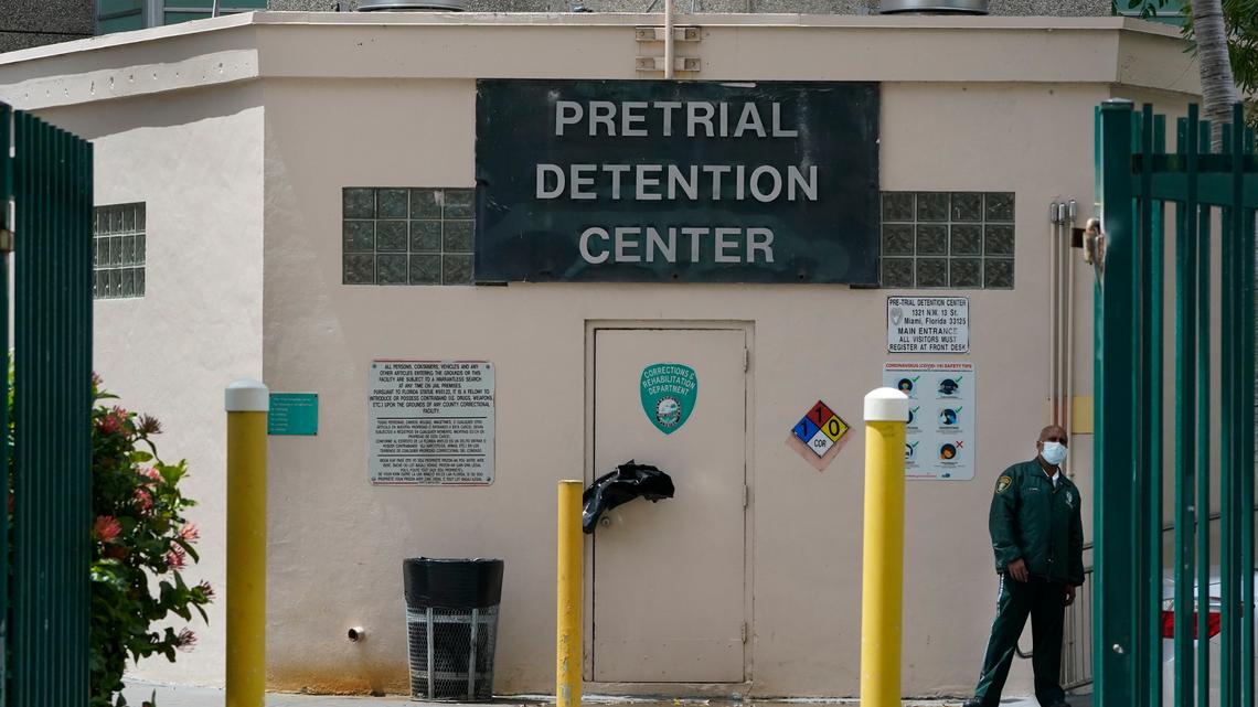 A corrections officer stands near a door at the Miami-Dade County Pre-Trial Detention Center, Friday, June 4, 2021, in Miami.