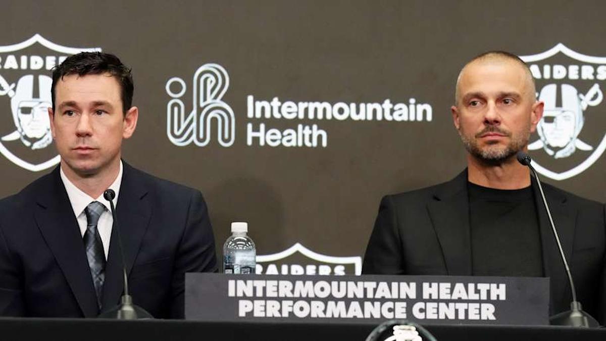  Feb 10, 2026; Henderson, NV, USA; Las Vegas Raiders coach Klint Kubiak (left) and general manager John Spytek at introductory press conference at Intermountain Health Performance Center. Mandatory Credit: Kirby Lee-Imagn Images | Kirby Lee-Imagn Images 