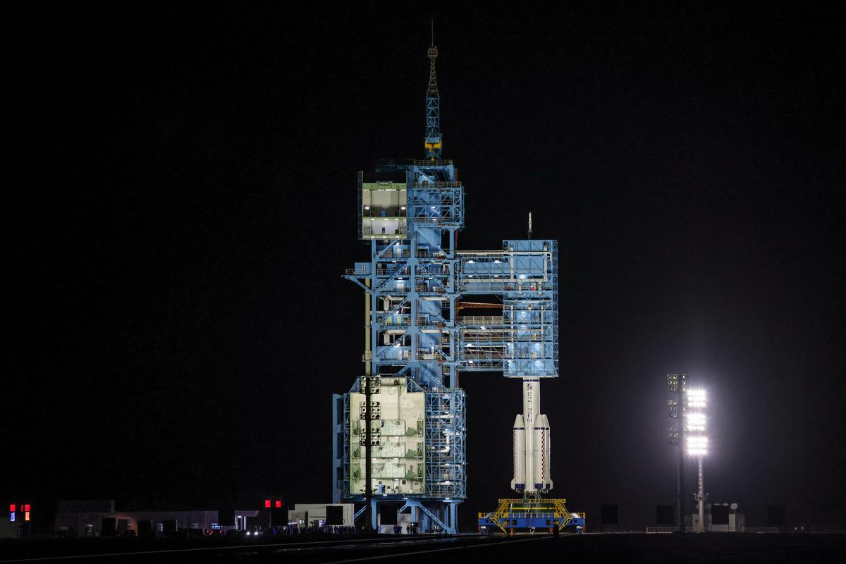 A Long March 2F rocket carrying the Shenzhou-23 spacecraft with astronauts Zhu Yangzhu, Zhang Zhiyuan, and Lai Ka-ying, who is the first astronaut from Hong Kong, before it blasts off to China's Tiangong space station from the launchpad at the Jiuquan Satellite Launch Center, near Jiuquan, Gansu province, China, May 24, 2026. REUTERS/Maxim Shemetov
