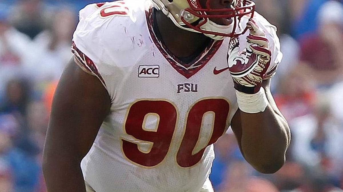  Nov 30, 2013; Gainesville, FL, USA; Florida State Seminoles defensive tackle Eddie Goldman (90) against the Florida Gators during the second half at Ben Hill Griffin Stadium. Florida State Seminoles defeated the Florida Gators 37-7. Mandatory Credit: Kim Klement-Imagn Images | Kim Klement-Imagn Images 