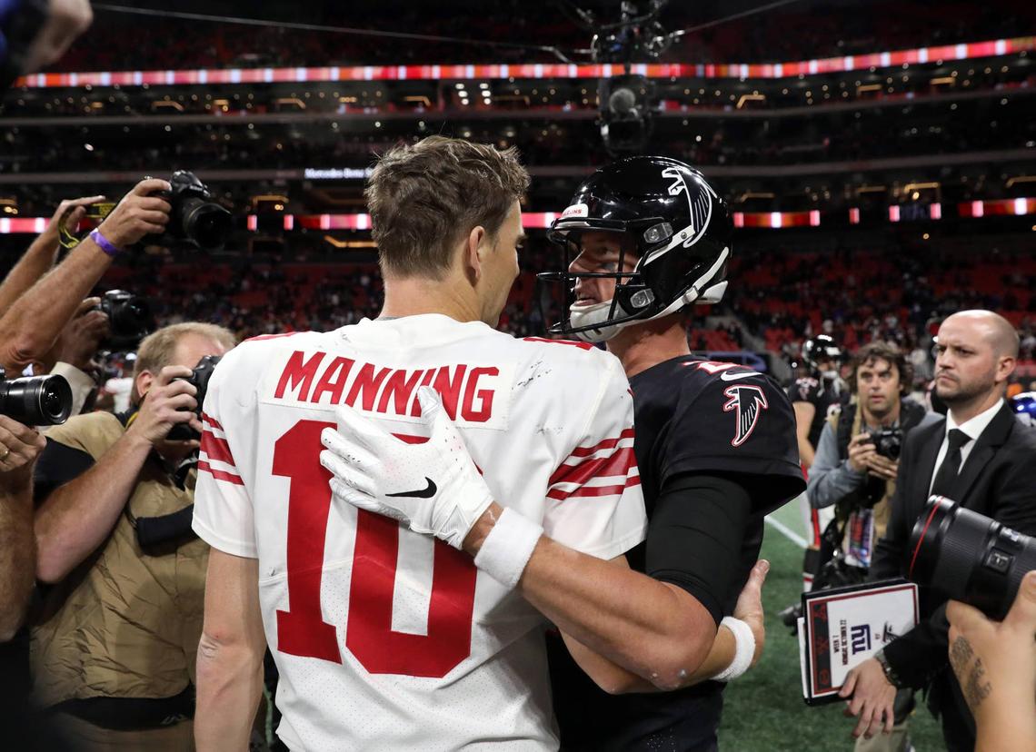  Oct 22, 2018; Atlanta, GA, USA; New York Giants quarterback Eli Manning (10) greets Atlanta Falcons quarterback Matt Ryan (2) after their game at Mercedes-Benz Stadium. Mandatory Credit: Jason Getz-USA TODAY Sports 